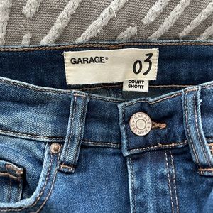 Garage jeans. Distressed knees. Size 3 brand new just no tags